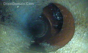 robotic cutter for drain junction